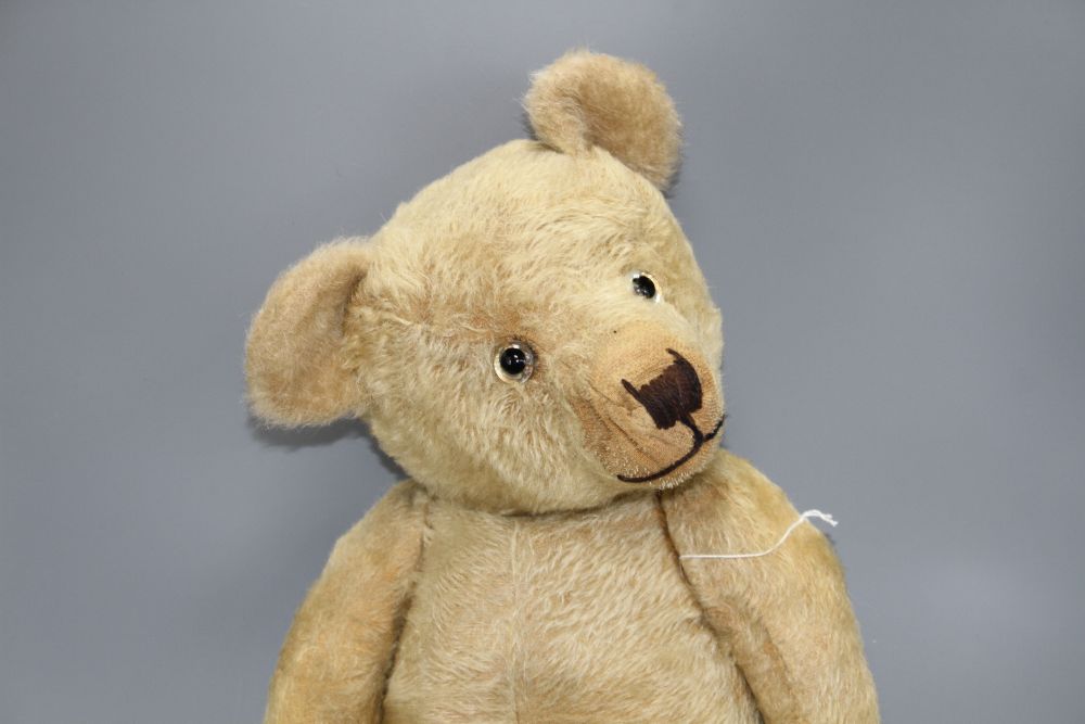 A Chiltern type English bear, c.1930s, 26in., three replaced paw pads, glass eyes